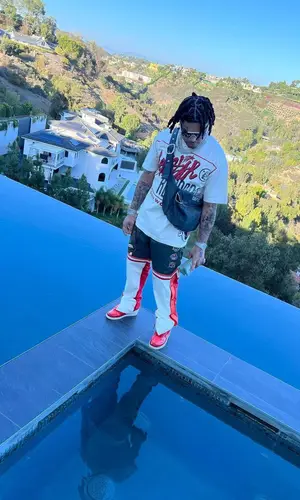 No Cap wearing Hellstar t-shirt