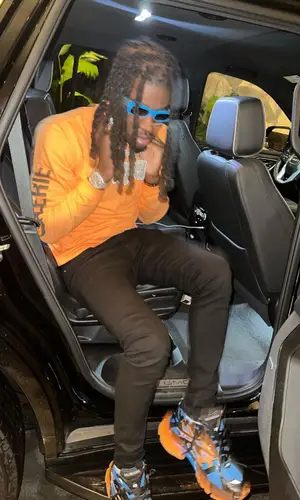 SleazyWorld Go wearing Balenciaga eyewear