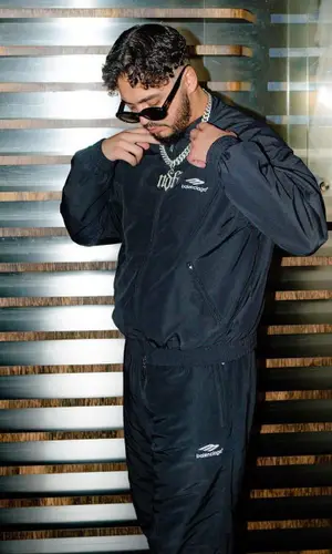 Kalim wearing Balenciaga jacket