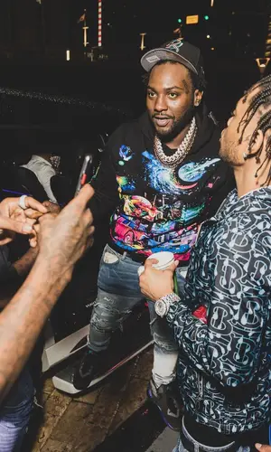 Peezy wearing Hermes belt