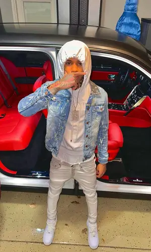 NLE Choppa wearing Valabasas jacket