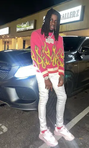 SleazyWorld Go wearing Palm Angels sweater