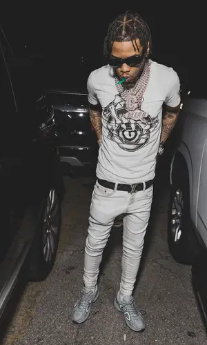 Lil Migo wearing Dior sneakers