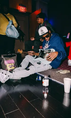 Lil Double 0 wearing Don't Let Mom Find Out jeans