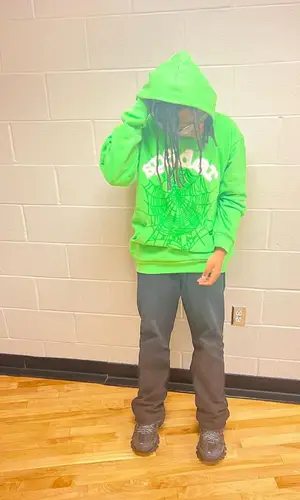 Maajins wearing Balenciaga sneakers