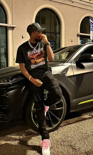 Alphonso Davies wearing Hypeneedz t-shirt