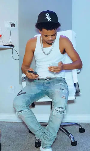 Loski wearing New Era cap