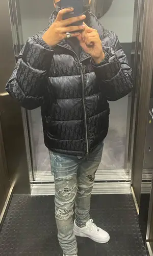 Loski wearing Amiri jeans