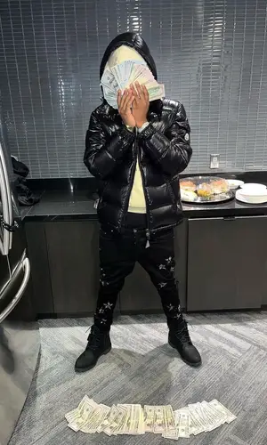Sha EK wearing Moncler jacket