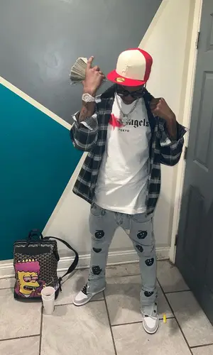 Lil Double 0 wearing Supreme shirt