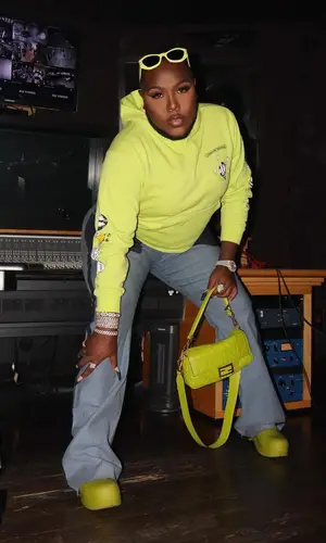 Saucy Santana’s Outfit in Chrome Hearts Hoodie, Bottega Veneta Boots & Dior Eyewear (2022)