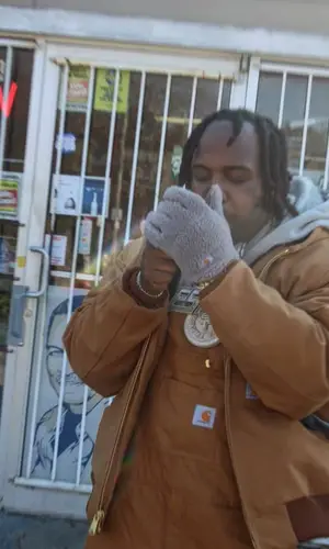 EST Gee wearing Nike sneakers