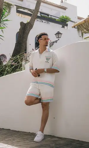 Curtis Jones wearing Casablanca shirt