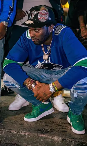 Peezy wearing Adidas jersey