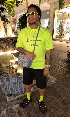 Lil Meech wearing Goyard bag