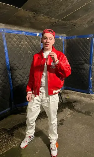 Aitch wearing Chrome Hearts cap