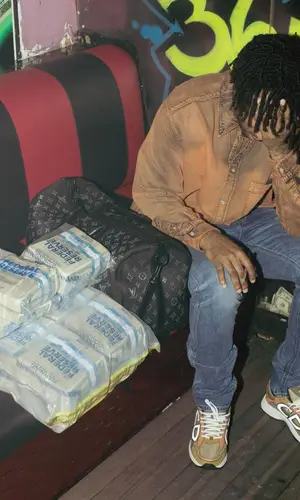21 Savage wearing Marni shirt