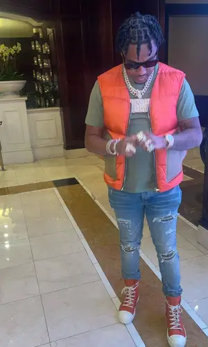 Tay B wearing Amiri jeans