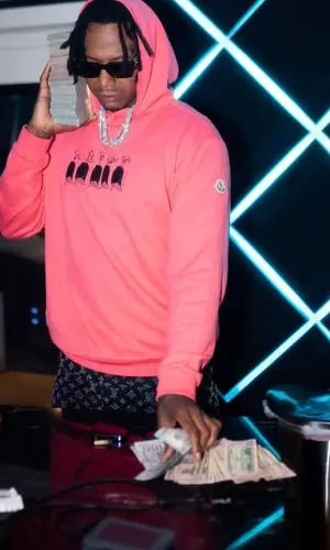 Moneybagg Yo wearing Cactus Jack sandal