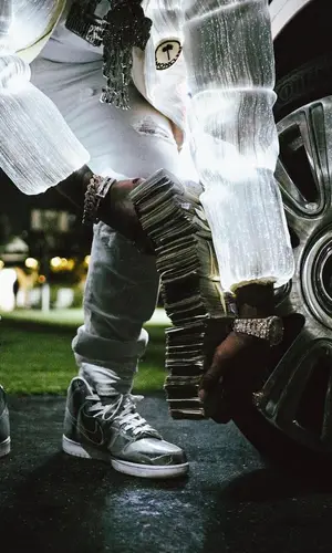 Finesse2tymes wearing Amiri jeans