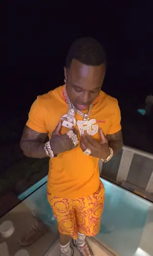BandMan Kevo wearing Versace sock