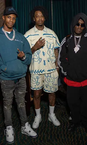 21 Savage wearing Lost Daze shirt