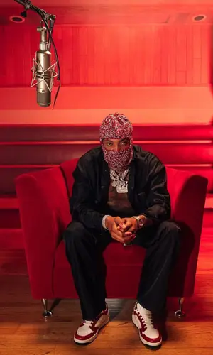 G Herbo wearing Prada shirt
