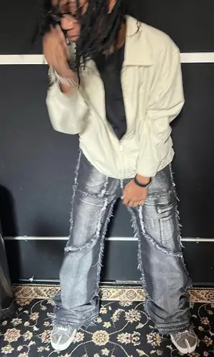Tana wearing No Faith Studios jeans