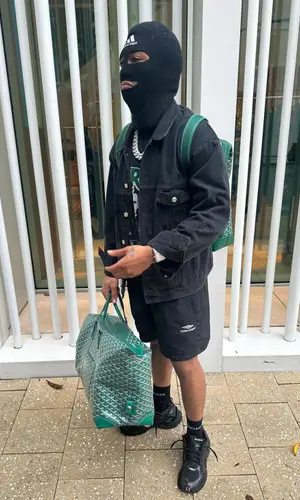 Lil Meech wearing Balenciaga sock