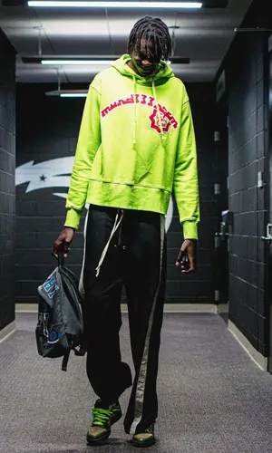 Bol Bol wearing Murd333r.Fm hoody