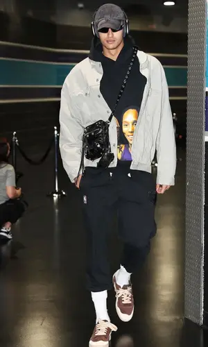 Kyle Kuzma wearing Balenciaga bag