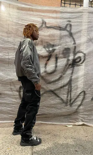 Hefna380 wearing Levi’s jeans