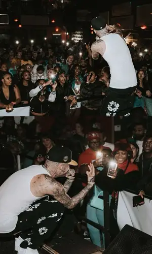 Millyz wearing Hanes top
