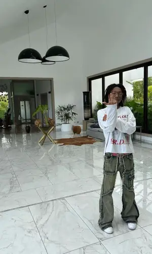 Lil Tecca wearing Enfants Riches Deprimes sweater