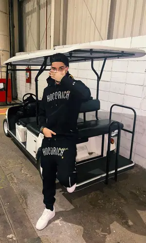 Veigh wearing Hoodrich hoody