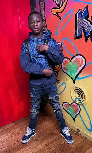 Bouba Savage’s Outfit in Dior Jacket, Amiri Jeans & Jordan Sneakers (2022)