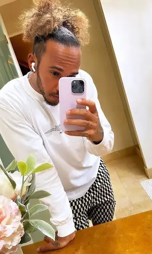 Lewis Hamilton wearing Nanushka swimwear