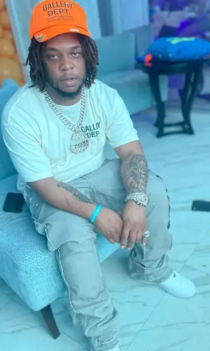 Don Q wearing Gallery Dept. t-shirt