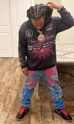 Don Q wearing Hellstar hoody