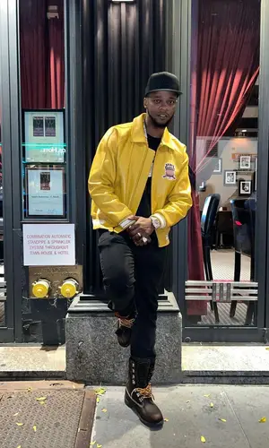 Papoose wearing Amiri jeans