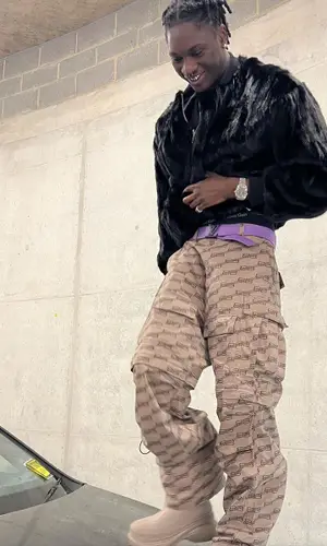 Jnr Choi wearing Balenciaga pants