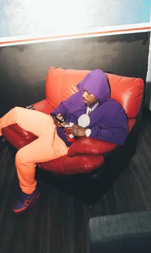 DaBaby wearing Balenciaga hoody
