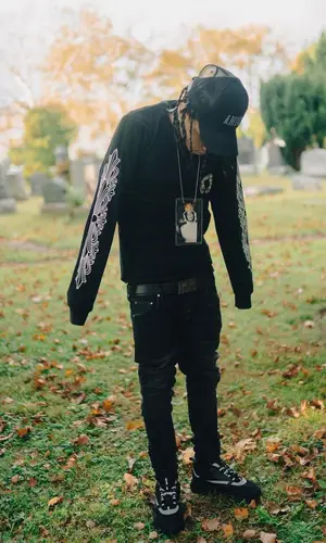 DD Osama wearing Chrome Hearts sweatshirt