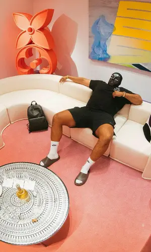M Huncho wearing Adidas sandal