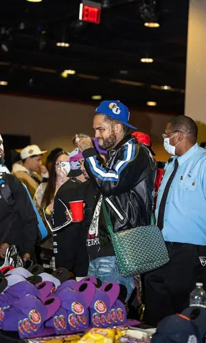 Dave East wearing Balenciaga eyewear
