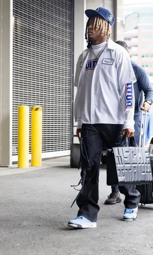 Xavier McKinney wearing Peels shirt