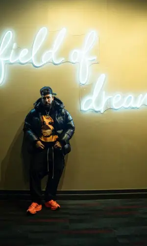 DJ Drama wearing Amiri hat