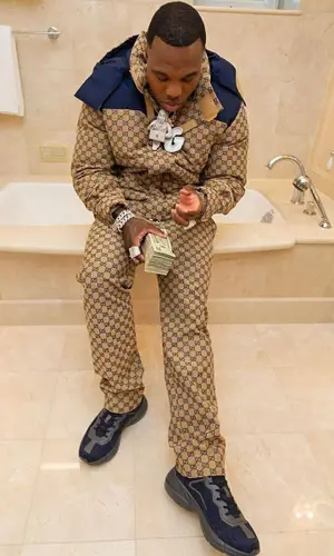 BandMan Kevo wearing Gucci pants