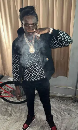 Yus Gz wearing Amiri jeans