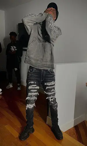 Kyle Richh wearing Amiri cap